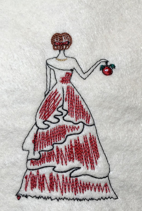 Back of Lady in Christmas Red Dress and Bauble in Hand