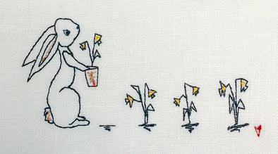 Easter Bunny Planting Flowers